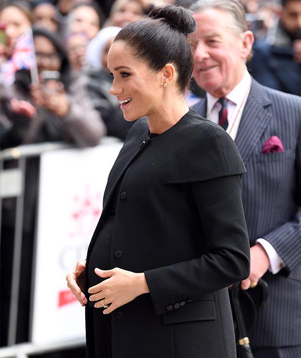 Styling her hair in a sleek bun, the royal looked radiant as she greeted guests and smiled at onlookers. *(Image: Getty Images)*