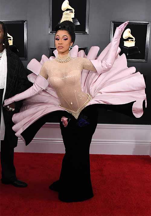 Ever the performer, Cardi B is literally blooming on the red carpet! *(Image: Getty)*