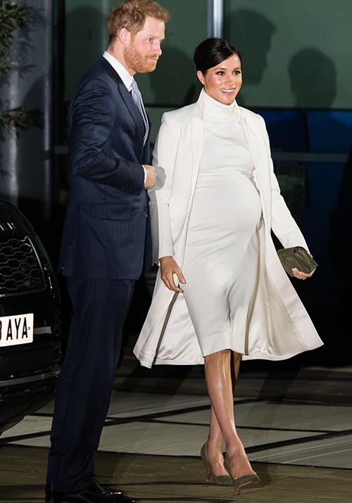 Duchess Meghan and Prince Harry stunned as they stepped out together in London. *(Image: Getty)*