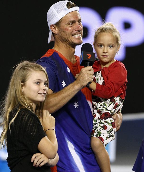 "They are going to have lifelong memories of this. Of being out there with me," Lleyton has said of his kids getting to witness him play on courts around the world. *(Image: Getty)*