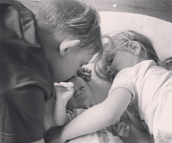 It's safe to say Adelaide is getting lots of love from her big brother and sister!