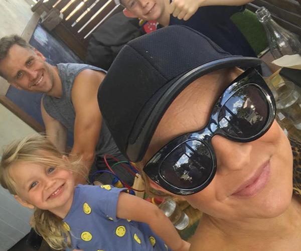 Cute! We love this family selfie Chris shared. We're assuming Adelaide was having a snooze!