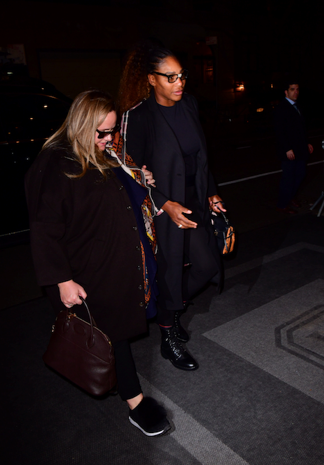 Serena opted for a chic all-black ensemble complete with dark-framed glasses. *(Image: Getty)*