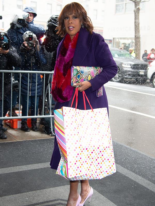 Gayle King's bright look brought some colour to the dreary day. *(Image: Getty)*