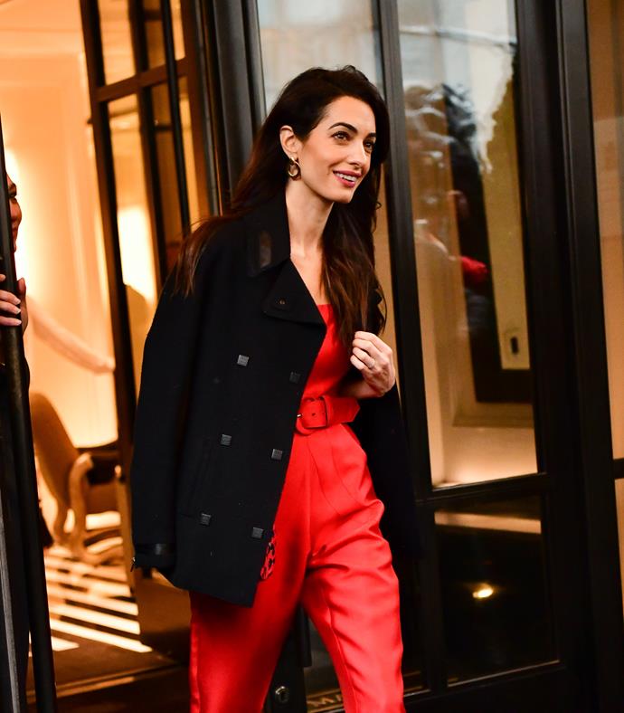 Amal Clooney looking stunning while leaving the baby shower. *(Image: Getty)*