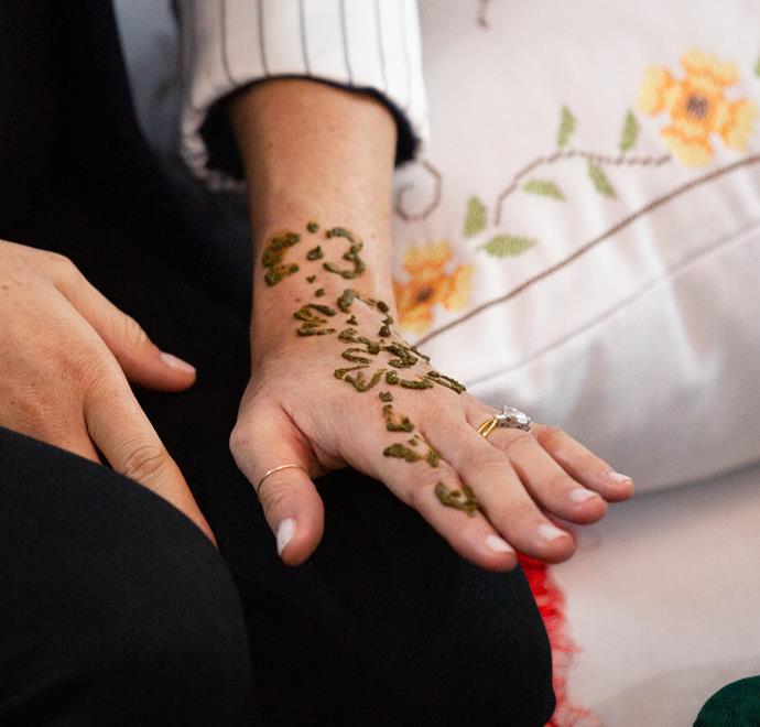The Duchess was given a Henna design on her hand and wrist. *(Image: Getty)*
