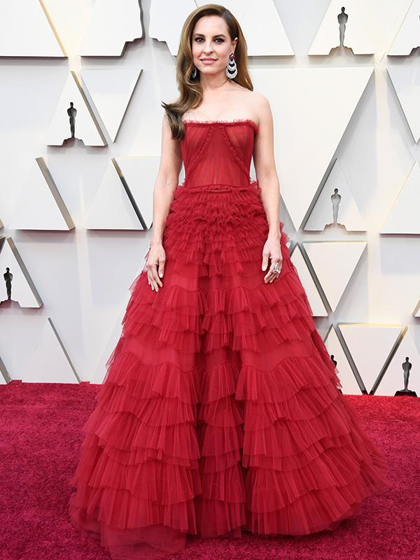 Mexican actress Marina de Tavira channels the red carpet quite literally in this rouge J. Mendel gown, and we're here for it.
