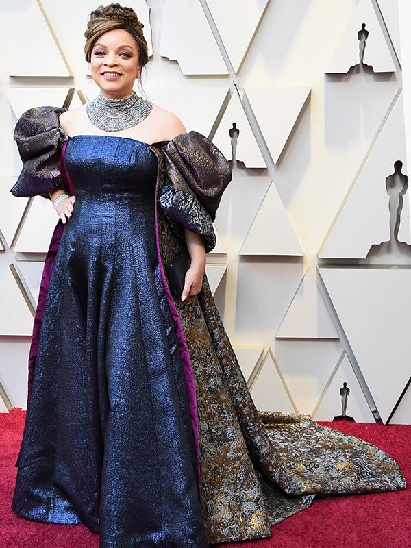 Costume designer Ruth E. Carter is no stranger to a flamboyant ensemble, and she hasn't disappointed tonight.