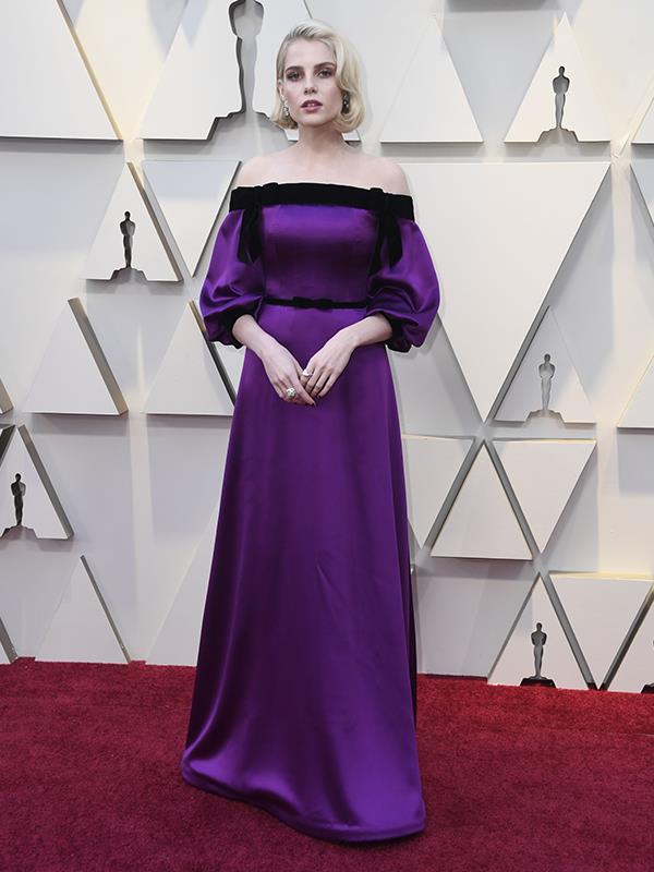 25-year-old American-British actress Lucy Boynton stole our hearts in *Bohemian Rhapsody*, but her Oscar red carpet performance isn't *quite* so showstopping in her custom Saint Laurent ensemble.