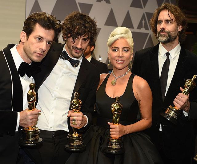 Four gold statues and four happy winners. *(Image: Getty)*