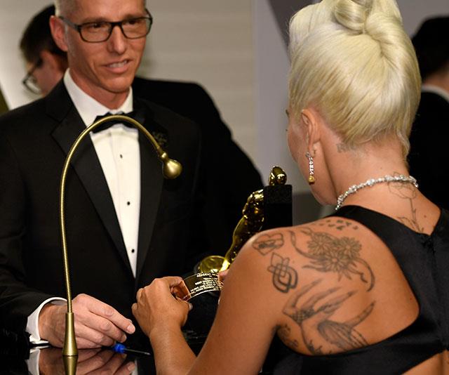 Gaga gets her name engraved on her gong *(Image: Getty)*