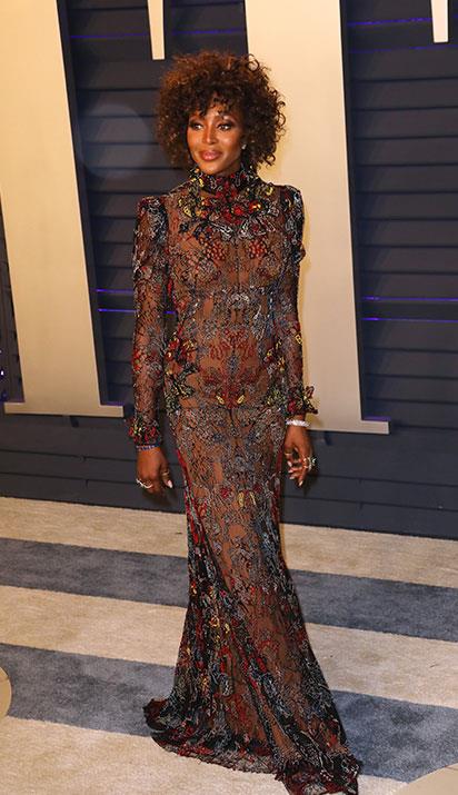 Naomi Campbell opted for a sheer Alexander McQueen dress. *(Image: Getty)*