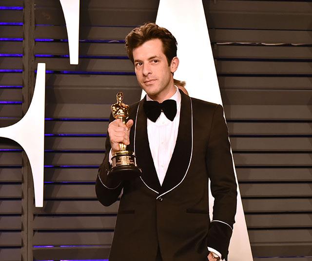 Best Song winner Mark Ronson isn't letting go of his golden statue anytime soon. *(Image: Getty)*