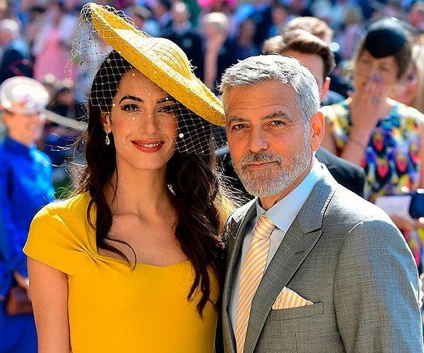 George Clooney's clued up lawyer wife Amal would provide Meghan with valuable advice. *(Image: Getty)*