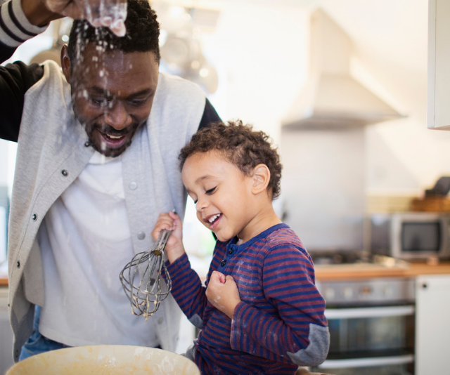 **Cooking in the kitchen:** Get ready to make a little mess! Set up some batch baking activities and cook the day away making snacks and treats to get you through the rest of the holidays. *Image: Getty.*