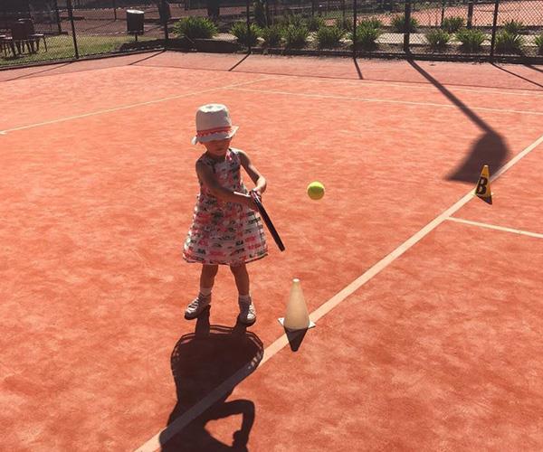 "Basically Serena Williams already." Proud dad Chris shared this snap of Evie with a tennis racket that's almost as big as her.