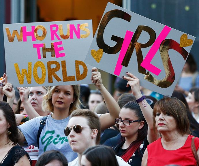 We always love reading the awesome signs at the Womens' Marches around the world. *(Image: Getty)*