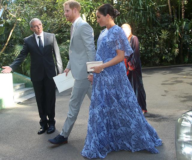 The chiffon printed frock was modified to include ruffled sleeves and a loosely fitted waist to cater to her baby bump. *(Image: Getty Images)*