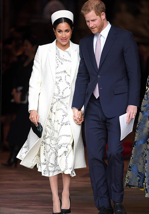Outfit change! Later in the day, Meghan stepped out for a second time at the Commonwealth Day service at Westminster Abbey.
<br><br>
Meghan wore a Victoria Beckham coat and dress paired with a pillbox hat and olive green heels.  *(Image: Getty Images)*