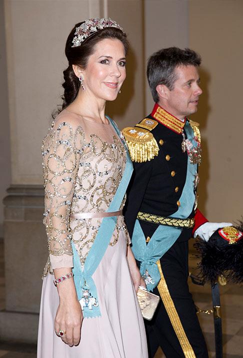 Mary and Fred make a glittering appearance at a dinner for Queen Margrethe's birthday in 2015.