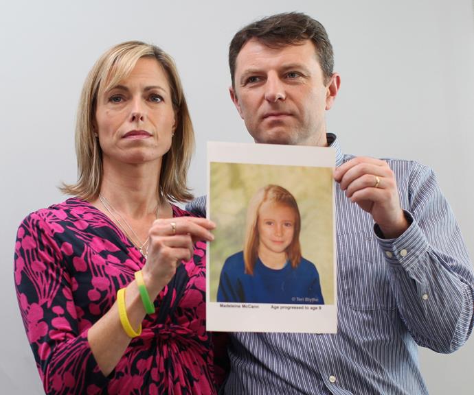 Kate and Gerry McCann with a digitally-altered photo of what their daughter Maddie might look like now. *(Image: Getty)*