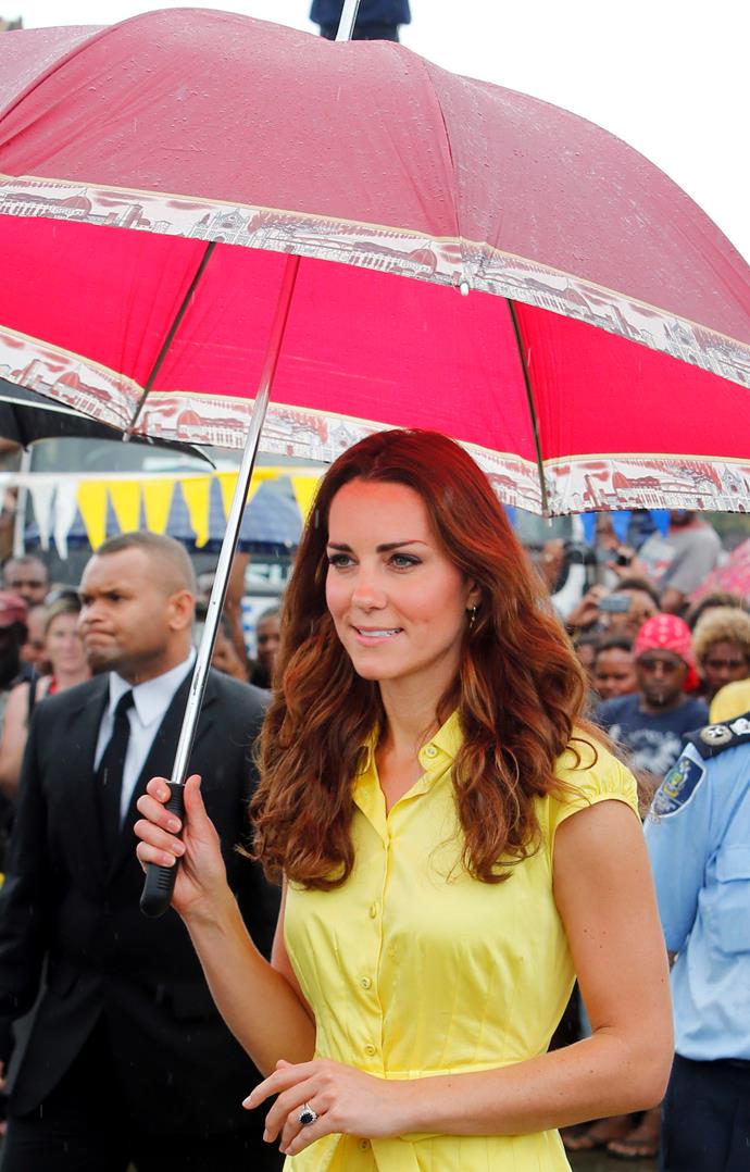 Duchess Catherine looking stunning in yellow, while on tour in the Solomon Islands in 2012.