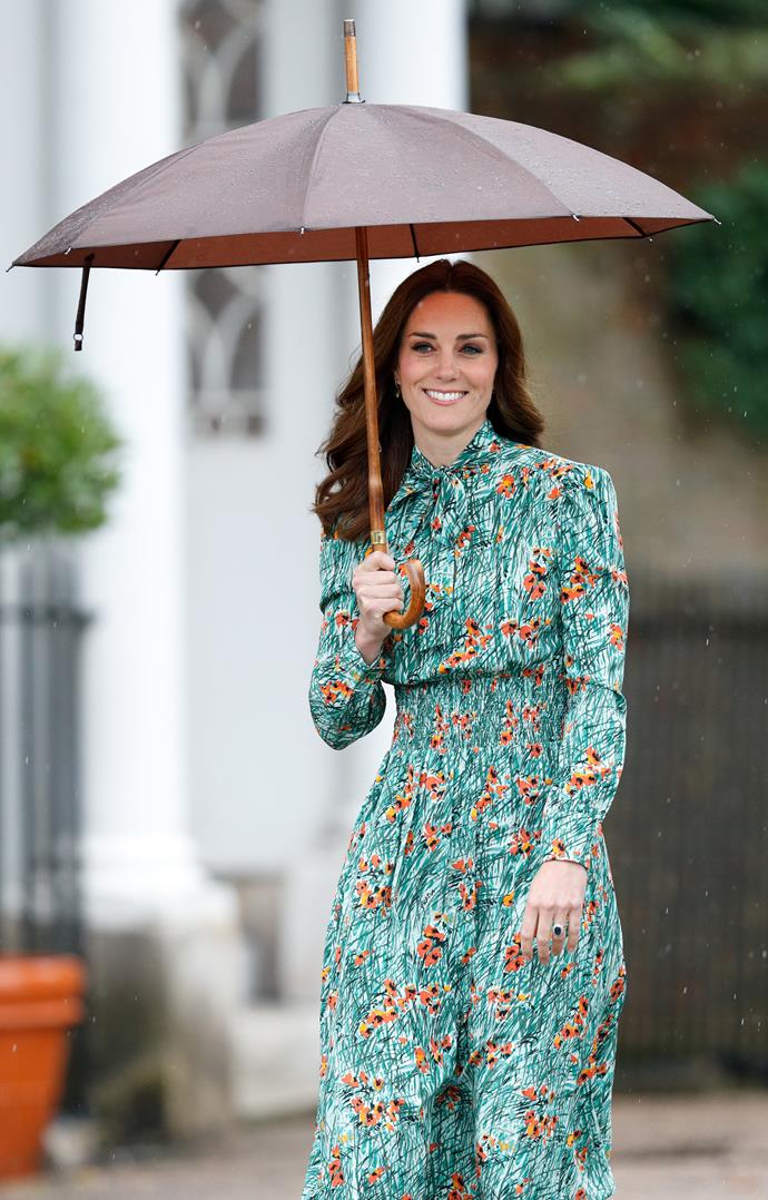Duchess Catherine looking glorious in this pretty floral frock, keeping that impeccable blow-dry fresh. *(Image: Getty)*
