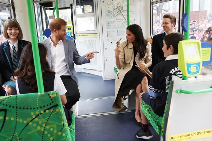 The ever-sensible Meghan wore flats for her commute. *(Image: Getty)*