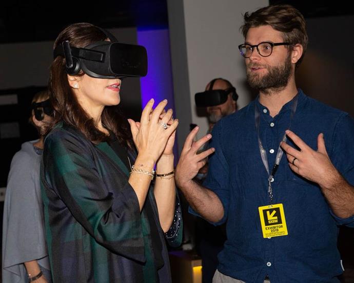 Princess Mary got into the thick of things in Texas by giving a pair of virtual reality goggles a go! *(Image: Getty)*