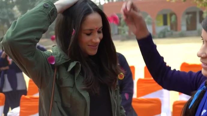 Meghan is seen experiencing beautiful elements of Indian culture in the footage. *(Image: ITV)*