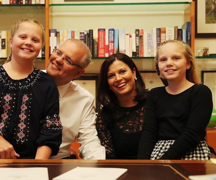 Scott and Jenny Morrison with their daughters Abby (left) and Lily (right) in their father's office in Parliament House, Canberra.