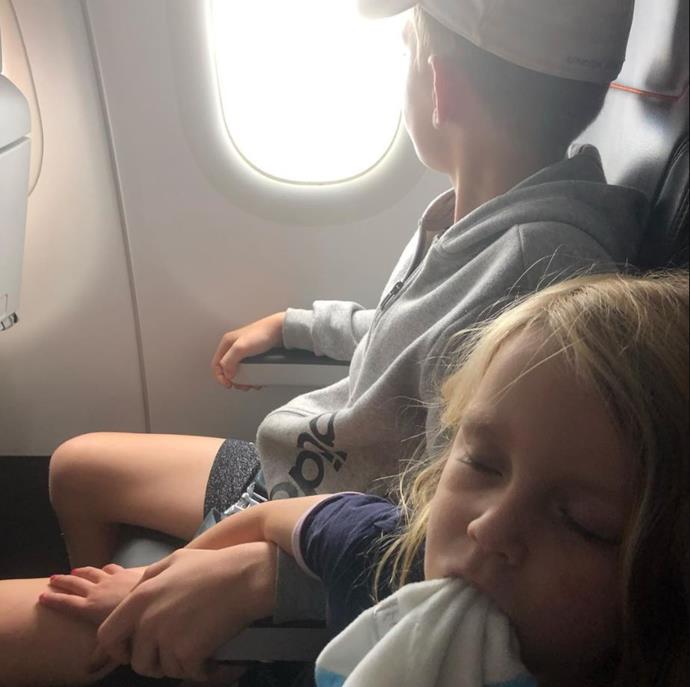 Looks like this trip tired little Evie out! At least she had her big brother to hold on to.