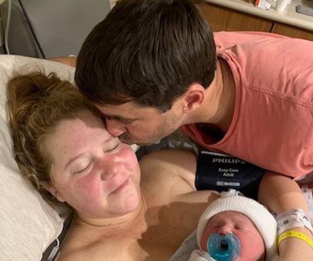 Amy and her husband with their newborn bub. *(Image: @amyschumer/Instagram)*