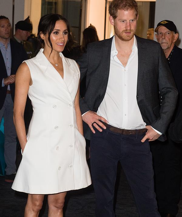 Meghan's white Maggie Marilyn tuxedo dress worn while visiting Wellington, NZ in October 2018 was a fan favourite. *(Image: Getty)*