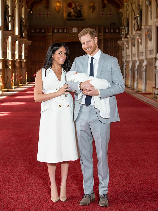 Meghan's stunning white dress held a special significance that you might have missed. *(Image: Dominic Lipinski / PA / Getty)*