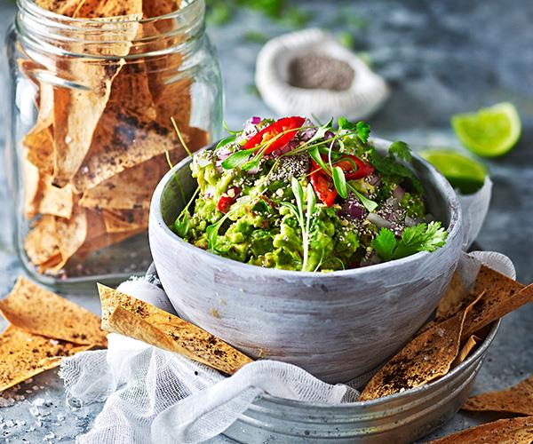 Kick things off with this **[chia and tomato guacamole with sumac crisps](https://www.womensweeklyfood.com.au/recipes/chia-and-tomato-guacamole-with-sumac-crisps-29589|target="_blank")** for a healthy start to the night.
