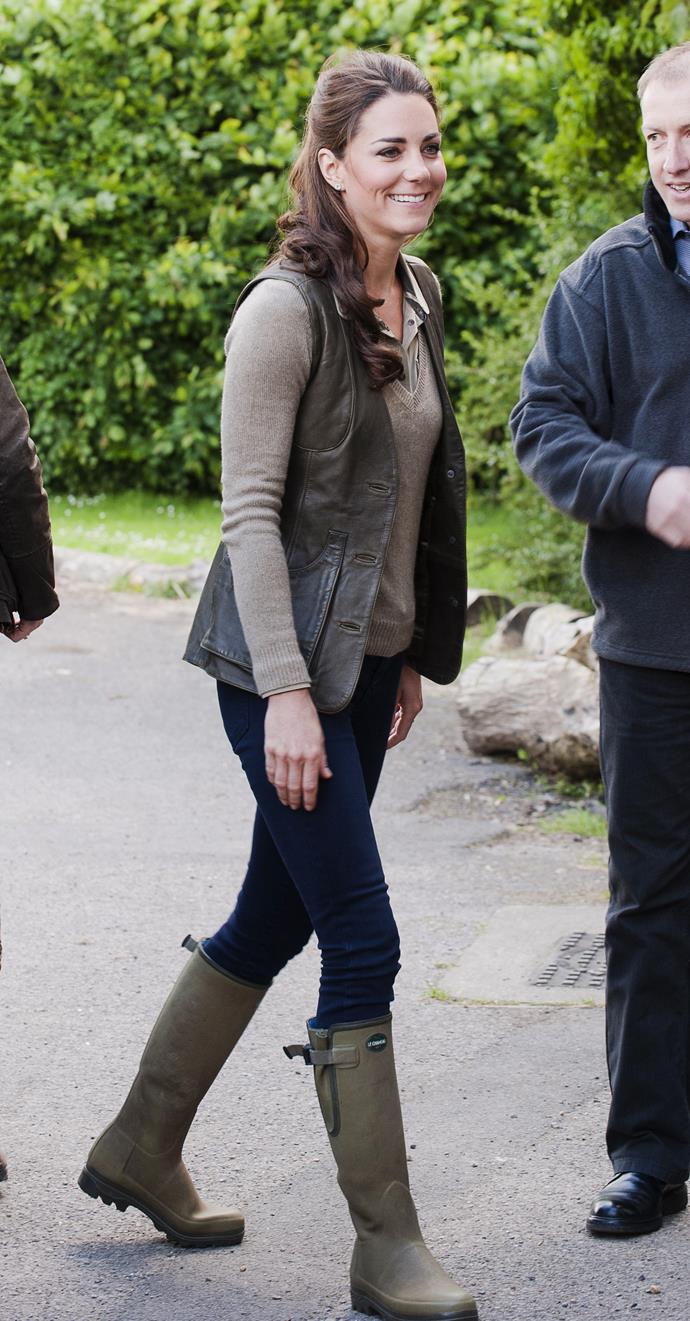 That same year, Kate rocked her now-iconic skinny-jeans-and-rain-boots look while visiting 'Expanding Horizons' Primary School. Her hiking-chic boots were designed by Le Chameau Vierzonord.