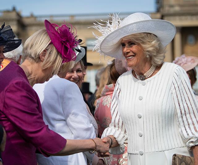 In May, Camilla and Charles hosted a [garden party at Buckingham Palace](https://www.nowtolove.com.au/royals/british-royal-family/buckingham-palace-garden-party-charles-camilla-55753|target="_blank") on behalf of the Queen, and the Duchesses all-white ensemble was a refreshing start to summer. 