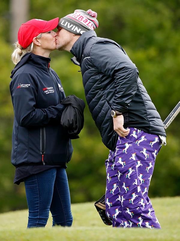 Zara Tindall and her husband Mike shared a smooch the ISPS Handa Mike Tindall Celebrity Golf Classic.