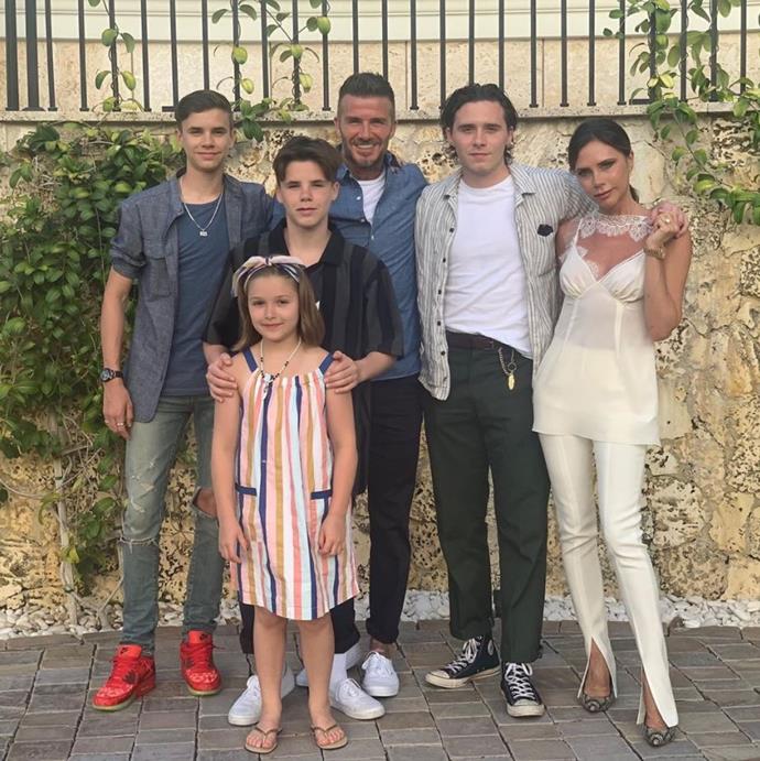 So grown up! The Beckham clan posed for a family photo during their holiday to Miami in June.