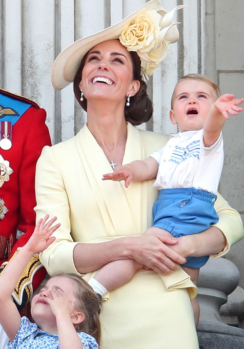 Prince Louis waves enthusiastically to the planes overhead. *(Image: Getty)*