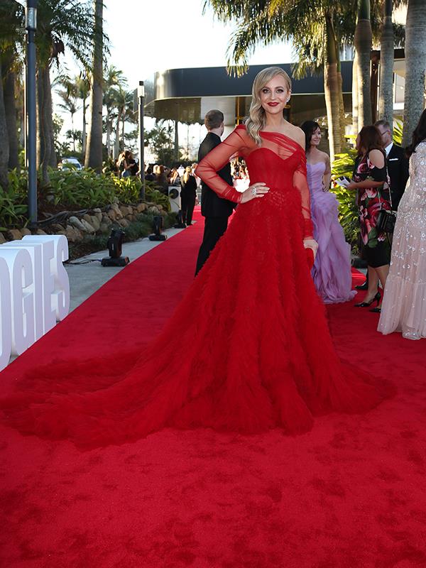 And Carrie is an absolute vision in this rouge gown. Utterly divine!