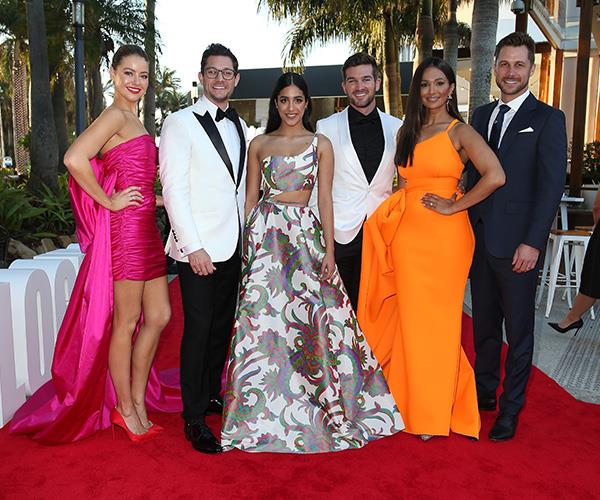 Adding a splash of colour to the red carpet are [Ramsay Street's finest](https://www.nowtolove.com.au/fashion/red-carpet/neighbours-logies-red-carpet-2019-56683|target="_blank")! April Rose Pengilly, Olivia Junkeer, Sharon Johal, Scott McGregor, Ben Hall and Rob Millsarrives *know* how to rock a red carpet.