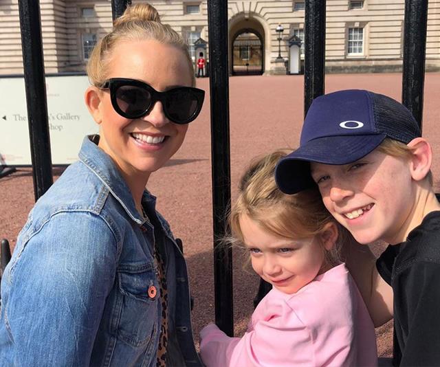 Carrie shared a snap of herself, Ollie and Evie outside the gates of Buckingham Palace after she was [awarded her Order of Australia](https://www.nowtolove.com.au/celebrity/celeb-news/carrie-bickmore-queen-order-of-australia-medal-56287|target="_blank").