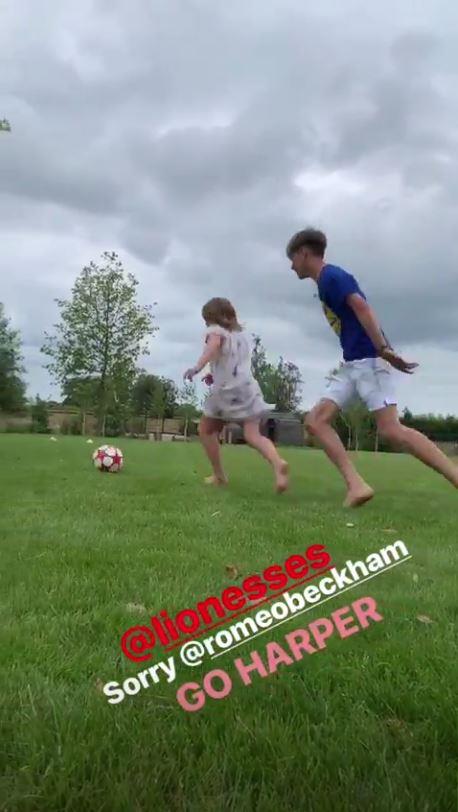 David also filmed daughter Harper kicking a football away from big brother with David exclaiming, "I can't believe I got that on film!"