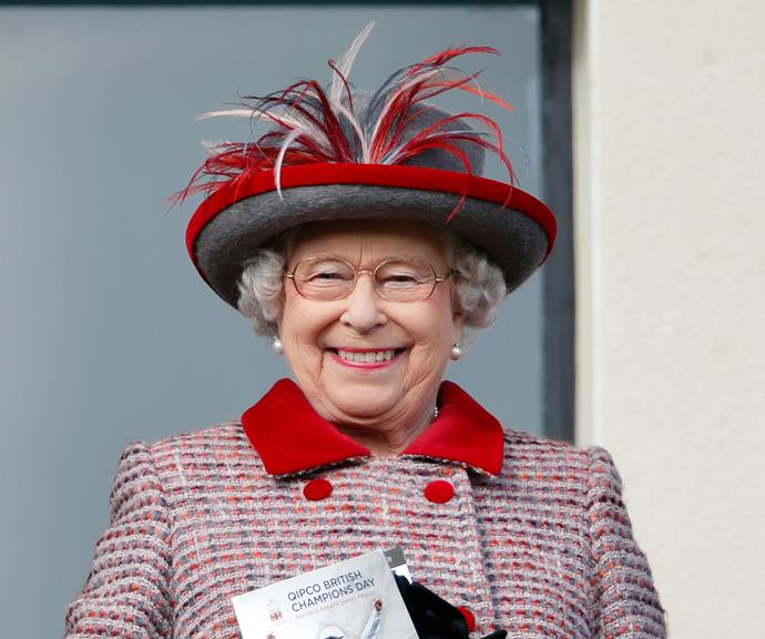 Queen Elizabeth II shares a joke with race horse trainer Sir Michael Stoute in Ascot in 2016.