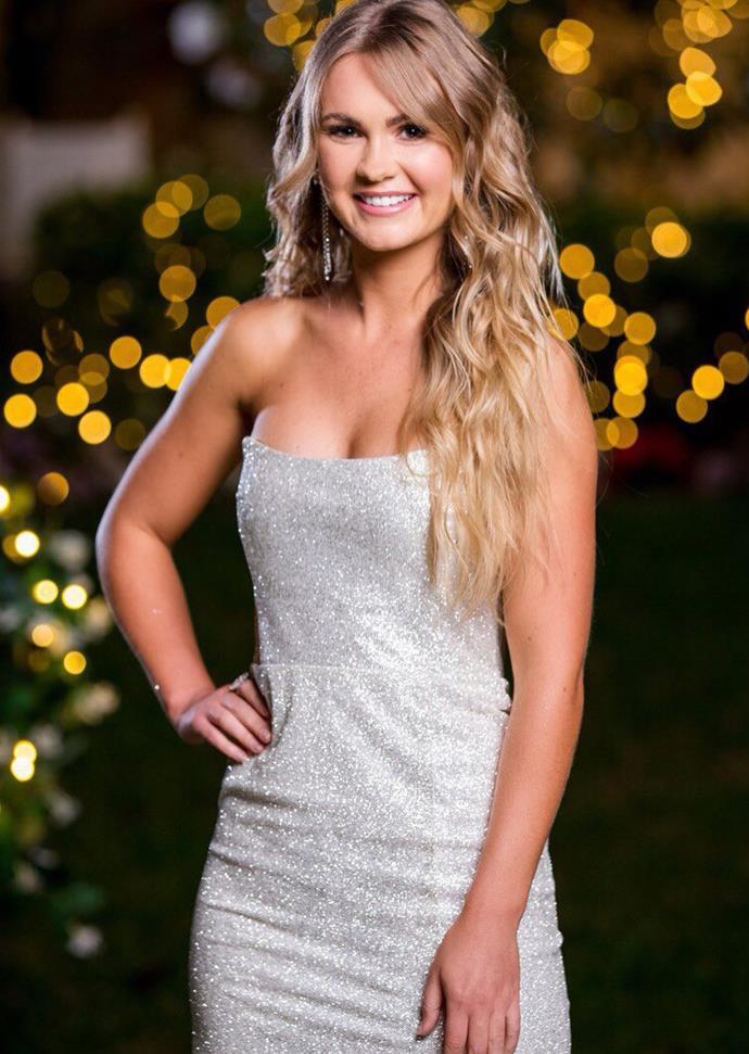 Chelsie showed off her lean physique in this strapless white sparkly frock.