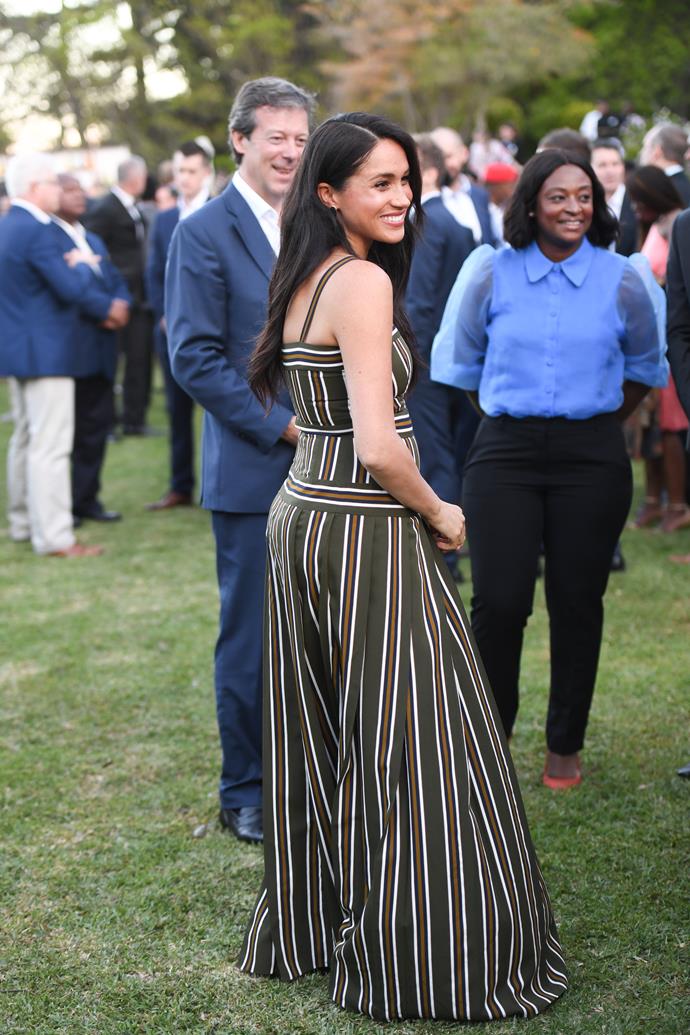 For her final engagement of the day, Duchess Meghan wore a Martin Grant maxi dress and accessorised the look with espadrilles and Karen Walker earrings.
