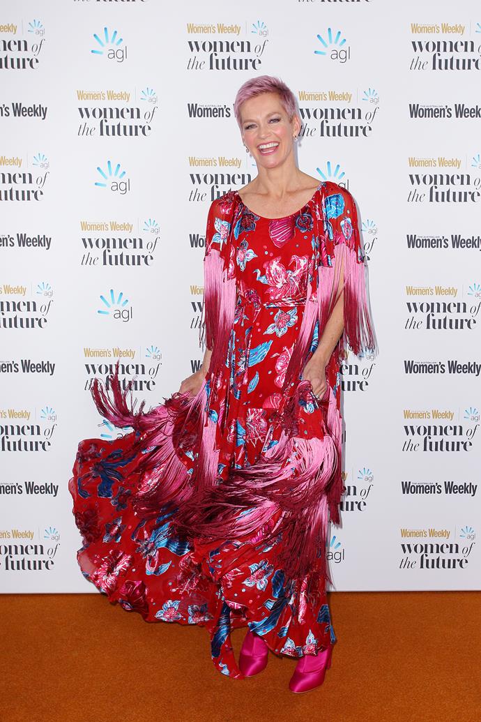 At *The Weekly*'s Women Of The Future event, Jess wowed in a tassled red and pink gown with matching pink boots. And it matched perfectly with her pink hair!
