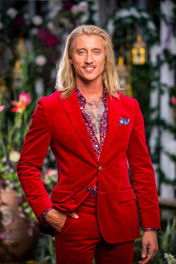 **Ciarran, Ex-Army Rifleman, 25, NT**
<br><br>
Described as "fun, flirty, flamboyant and fabulously British," Ciarran makes a dashing first impression on Angie, showing up in a show-stopping red suit.
<br><br>
Declaring he feels like "a sexual Willy Wonka," he certainly makes his mark on the red carpet. Will Angie like his cheeky side?